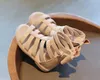 HBP Non-Brandneue Bogen Kinder Baby flache hohle römische Schuhe Kinder hohe Röhrenriemen flache Sandalen für Mädchen