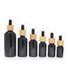 Bouteilles 8pcs Couverture en bois Noir Flacon compte-gouttes rechargeable Huile essentielle Verre Liquide 5-100ml Goutte pour pipette de massage