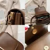 Sacos de ombro pequena cor sólida crossbody saco para mulheres inverno fivela ferrolho multi pochette elegante designer bolsa com moeda