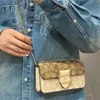 2024 Olay Damen-Handtasche mit farbiger Kette, klassischer Blumenkreuz-Unterarmtasche, 70 % Rabatt im Großhandel