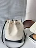 2024 designer lona balde saco sazonal moda masculina e feminina novo ombro crossbody bolsa casual esportes moeda bolsa