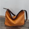 Sacs de soirée Grande capacité Sac seau d'eau Sac à bandoulière pour femme Fourre-tout Couche de tête de vache Style coréen Sac à main en cuir véritable Casual