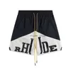 Shorts de gymn gros homme brut des créateurs de créateurs de créateurs à motifs à cinq points de course à pied Sport Dry Swim Rhude Basketball Y2