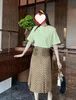 24 jupe trapèze pour femmes avec tissu floral/décoration de poche en denim/tempérament à la mode et polyvalent, luxe discret 309