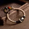 Braccialetti con ciondoli Bracciale con dente di tigre tibetano intrecciato a mano Stringa di perline Dzi Giocatore letterario maschile Intagliatore decorato a mano in stile folk retrò