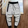 2024 Pantaloni in pile tecnici di fascia alta Designer Pantaloni sportivi da uomo Felpe con zip intera Tuta Pantaloni da strada Felpe con cappuccio Set per uomo Pantaloni Tute casual da uomo