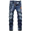 Jeans da uomo firmati Marchio alla moda Toppe in difficoltà Linee colorate disordinate Stampate Piccolo tubo dritto Vita media High Street Casual e alla moda per uomo