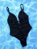 Kvinnors badkläder sexig svart rygglös en bit baddräkt kvinnor klipper ut v-ringning monokini baddräkt