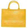 Bolsas de hombro Cesta de mano Bolsos de diseñador Jelly Tote Bag Gran capacidad Almacenamiento de compras Candy Color Hollow Beach 240311