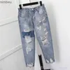 Damenjeans Neue Übergröße Damen Neun-Punkt-Loch-Denim-Haremshose Lose Bettler Knöchellange Kreuzhose Zerrissene Jeans für FrauenC24318