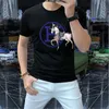2024 Novo Estilo Luxo Mens Designers Camiseta Homem Mulheres Camiseta com Letras Hot Drill Mangas Curtas Camisas de Verão Homens Soltos Tees Tamanho Asiático M-4XL