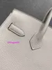 Borse da donna in vera pelle L Pura borsa da donna cucita a mano con fibbia in oro 30 milkshake bianco Togo litchi borsa da donna portatile in pelle di vitello con fibbia borsa di grande capacità