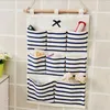 Sacs de rangement Sac suspendu au mur Simple coton et placard multifonction 8 poches pochettes en tissu de lin garde-robe