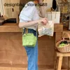 Hot Leather Goods Korean Edition Simple and Casual Handmade Checker Knitted Handheld One Shoulder Crossbody Bucket Small Bag Womens