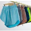 Shorts di limone da yoga Women Algin Sports Hottty Hot High Waist Track che gestisce tasche laterali con le laterali