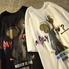 Marque de mode américaine hiphop rétro imprimé T-shirt Street Personnalité Men lâche décontracté harajuku surdimensionné haut 240315