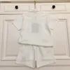 Nieuwe kinderkleding baby trainingspakken Geborduurd logo jongens T-shirt set Maat 110-160 CM zomer designer POLO shirt en shorts 24Mar
