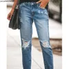 Heta säljer kvinnors jeans Inga kula smala hål tvättade byxor