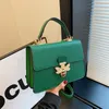 Senhoras bolsa de ombro 5 cores rua personalidade fivela de ouro bolsa feminina Joker lichia padrão cor sólida mochila de couro elegante bolsa de diamante 8310 #