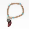 Bracelets à brins pour femmes et filles, bijoux Boho faits à la main, perles d'argile, plumes, accessoires de poignet, cadeau féminin