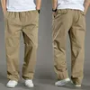 Mäns byxor byxor för män Lossa casual man rakt bred fickan stilig streetwear försäljning trend baggy i polyester