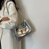 Pas cher en gros liquidation limitée 50% de réduction sac à main petit sac fourre-tout de banlieue Sier femmes Millennium Girl Dingdang Premium mode une épaule sous les bras sac à main