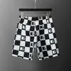 Pantaloncini sportivi da uomo Rhude pantaloncini da uomo designer nylon modal beach quarter shorts pantaloncini casual con lacci pantaloncini eric manuel pantaloncini firmati