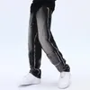 Męskie dżinsy hip-hop w trudnej sytuacji szerokopasmowe spodnie Mężczyźni rozszerzone dżinsowe spodnie Mężczyzna Vintage luźne swobodne japońskie streetwear B174