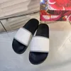 Pantofola di design donna uomo lusso diapositive sandali piatti muli moda estate spiaggia pantofole con suola in gomma sandalo interno lettera stampa scarpe casual taglia 35-45
