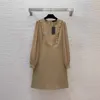 2024 Spring Black / Khaki Solid Color Panelled Dress Long Sleeve Round Neck Buttons Knee-Length Casual Dresses B4M181407