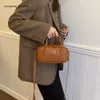 Pas cher en gros liquidation limitée 50% de réduction sac à main haut de gamme Boston sac d'oreiller portable pour femmes automne/hiver nouvelle mode polyvalente une épaule bandoulière