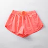 Shorts di limone da yoga Women Algin Sports Hottty Hot High Waist Track che gestisce tasche laterali con le laterali