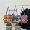 Topp axelväskor Etnisk stil stor kapacitet shoppingväska mode vävd designer handväskor totalt temperament kvinnor 240311