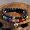 Strand oaiit 6mm vulkanisk stenarmband 7 chakra kärlek hänge lindade reiki yoga bönenergi smycken för män kvinnor