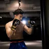 Équipement de protection Gants de boxe professionnels adultes hommes et femmes Sanda entraînement au combat épaississement Kickboxing sacs de sable soutien commun karaté yq240318