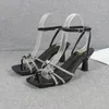 Sandaler skor för kvinnor 2024 Summer Crystal Strap Buckle White High Heel Stiletto Fashion Party Sexy Women's