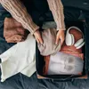 Borse portaoggetti Borsa da viaggio Custodia antipolvere Organizzatore impermeabile portatile Pieghevole cosmetico trasparente per viaggi di lavoro a casa