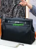 Borse in pelle fatte a mano HB Versione personalizzata 50 Borse per bagagli di grande capacità Borse Ky50 2024 Nuove borse lisce nere Volantino di borsa a tracolla per mestolo da donna