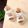 Sandalen Kinder Schuhe 2023 Sommer Hohl Flache Sandalen Süße Bogen Solide Mädchen Schuhe Baby Römischen Sandalen Casual Weiche Sohle Strand schuhe AliasC24318