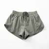 Shorts di limone da yoga Women Algin Sports Hottty Hot High Waist Track che gestisce tasche laterali con le laterali