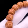 Strand Wild Monkey Head Walnut المنحوت Guanyin النحت المصنوع يدويًا سوار مصدر الدائرة الفردية المصدر