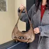 Günstiger Großhandel, begrenzter Ausverkauf, 50 % Rabatt, Handtasche, neue französische Dign Sense-Tasche für Damen, Herbst, minimalistische Unterarm-Vielseitigkeit, Einzelschulter