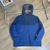 2024NORTH MORTED FABRICSMEN AND WOMENSPLICING JACKET WAME COAT FASHIONOUTDOOR FUNCTIONHIGH密度ウォータープルーフと防風性の迅速な乾燥と通気性