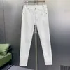 Jeans da uomo firmati Luce di lusso Qualità Autunno e inverno Slim Fit Elastico di fascia alta Versatile Nero Bianco Pantaloni a gamba dritta per tutte le stagioni 7X8Z