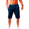 Pantaloncini da uomo in lino casual estivo traspirante cinque punti pantaloni sportivi da spiaggia in cotone tinta unita larghi da jogging