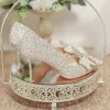 Boots Rimocy Luxury Chaussures de mariage en cristal brillant Femme Perle Bowknot Talons minces pompes Femme Shinned Point