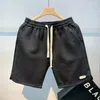 Shorts masculinos 2024 moda mistura de algodão cor sólida cintura solta verão multi bolso praia casual calças esportivas