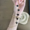 Pulsera de trébol de 4 hojas Pulsera de trébol de diseño de cuatro furgonetas Joyería de hojas Brazalete con dijes de 4 claves para mujer Flores de doble cara Hierba Conchas marinas Acero de titanio Nuevas cinco flores