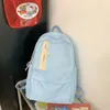 Sırt çantası 2024 Basit tasarım düz renkli kadın genç öğrenci okul çantası genç kızlar erkek erkek adam kitap sırt çantası