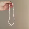 Collier polyvalent de perles en argent cassé pour femme en automne et en hiver, chaîne de cou légère à double couche, chaîne de clavicule unique et de luxe